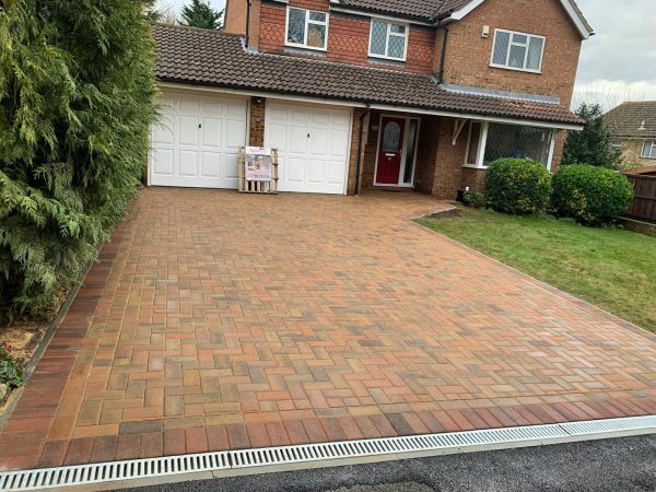 Fitting paving on a driveway in Bickley, London