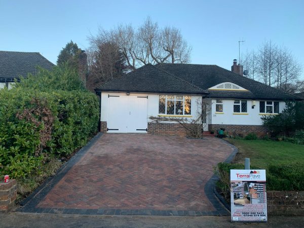 Fitting paving on a driveway in Chelsfield, Kent