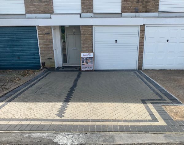 Fitting paving on a driveway in Chelsham, Surrey