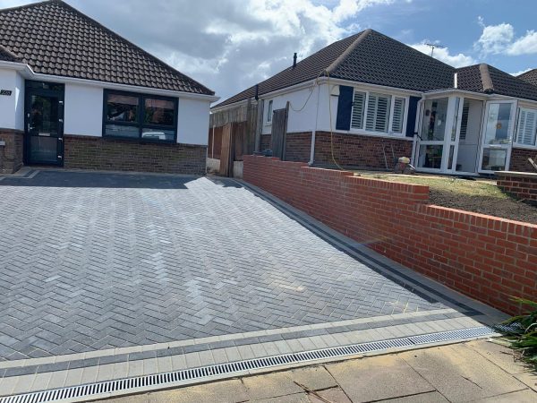 Fitting paving on a driveway in Keston, Kent