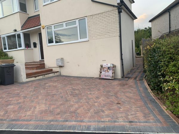 Fitting paving on a driveway in Orpington, Kent