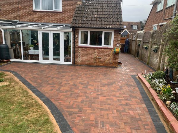 Fitting paving on a driveway in Leaves Green, Kent