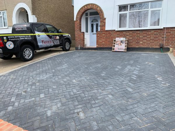 Fitting paving on a driveway in Leaves Green, Kent