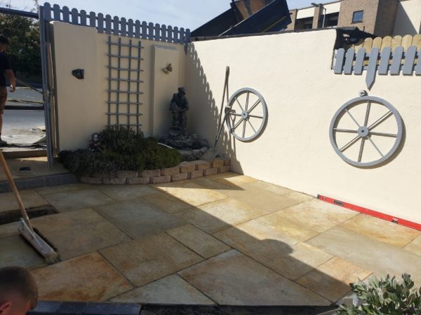 Fitting a new patio in Shipley Bridge, Surrey