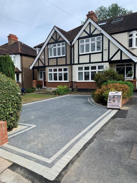 Fitting paving on a driveway in Smallfield, Surrey