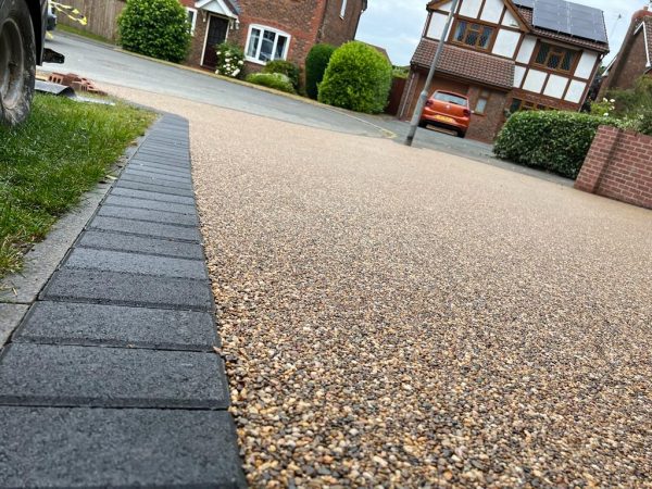 Laying resin surface on a driveway in Chevening, Kent